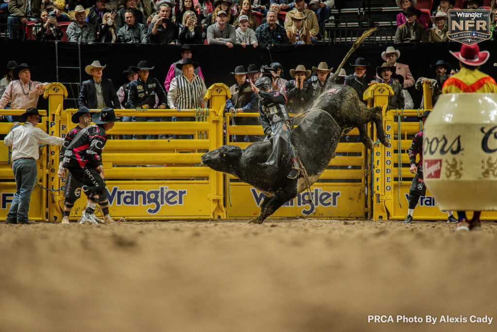 Outlaw Buckers' Blue Magic and T.J. Gray - 2nd at NFR Round 5. PRCA photo by Alexis Lady