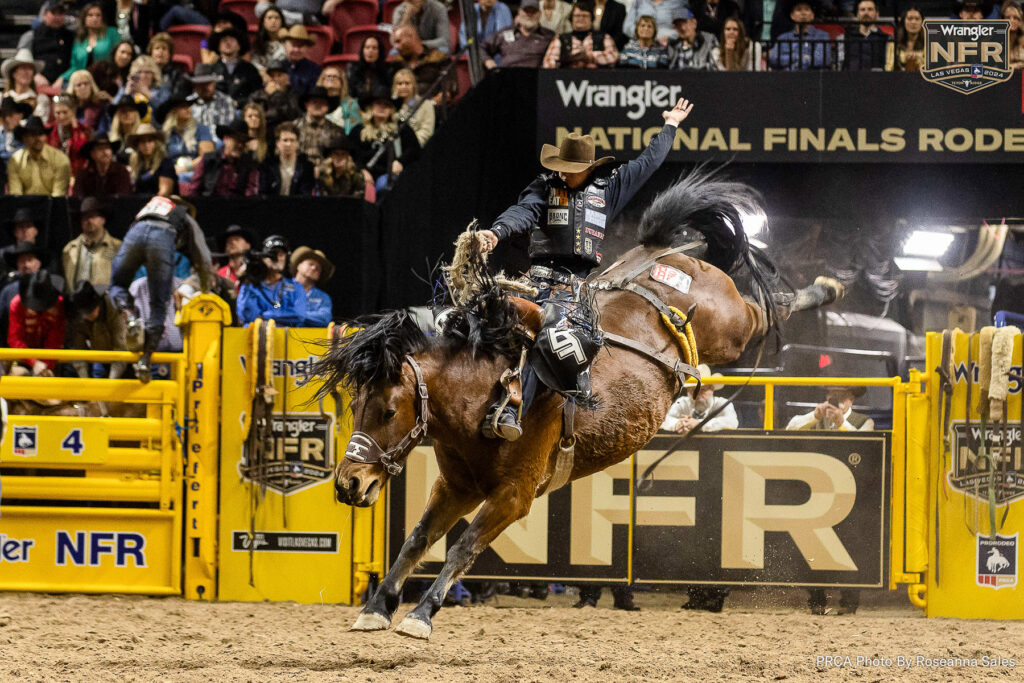 Saddle Bronc Rider Zeke Thurston on Powder River Rodeo's Miss Valley. PRCA photo by Roseanna Sales