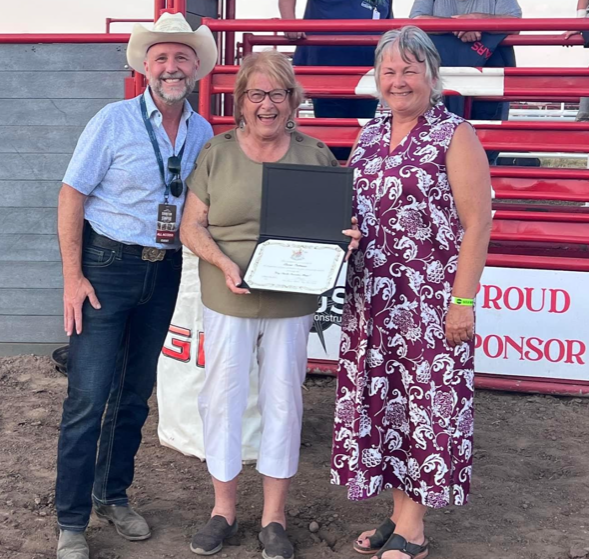 MLA Mike Bernier presenting Dawson Creek Exhibition and Connie Patterson Coronation Medal from King Charles III