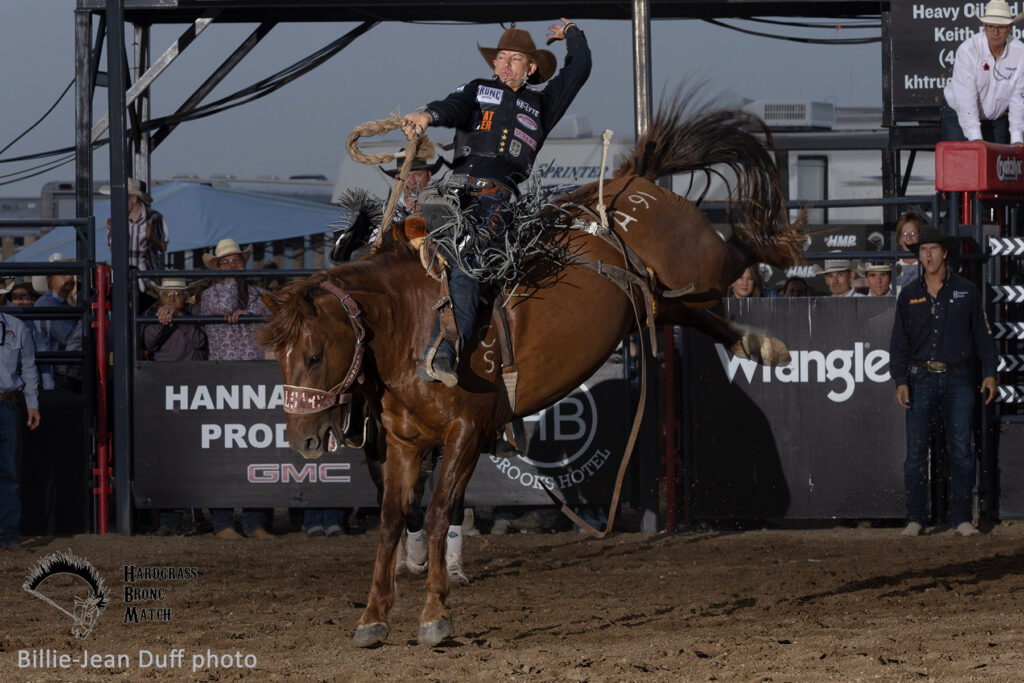 Zeke Thurston & Calgary Stampede's A-91 AGENT LYNX. 2026 Hard Grass Bronc Match Champion photo by Billie-Jean Duff
